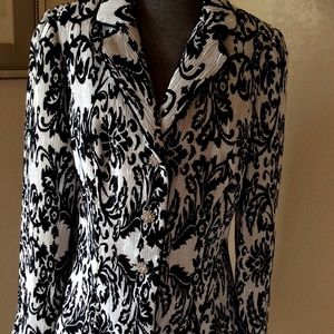 Striking black and white jacket with rhinestone buttons